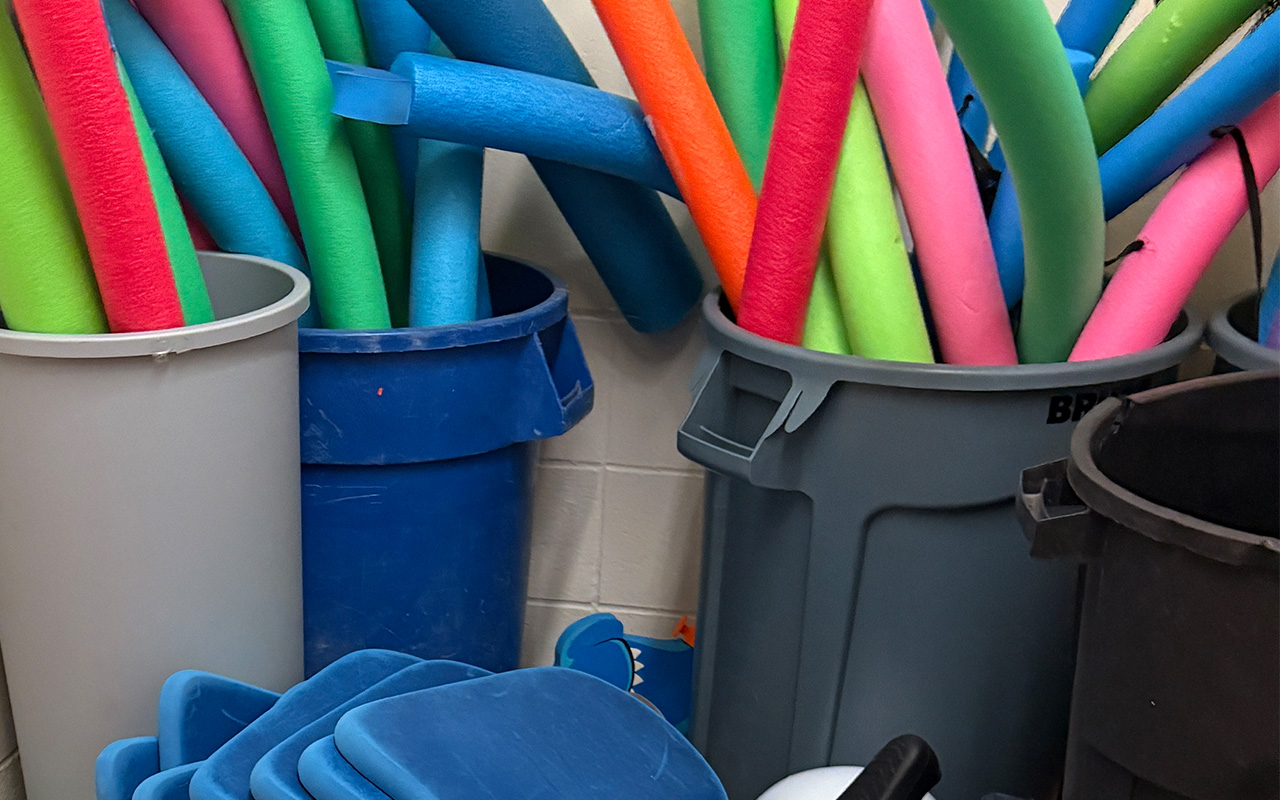 pool noodles in garbage can